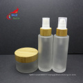 custom luxury glass pump lotion shampoo bottle with bamboo pump cap 50ml 100ml 200ml BJ-213B